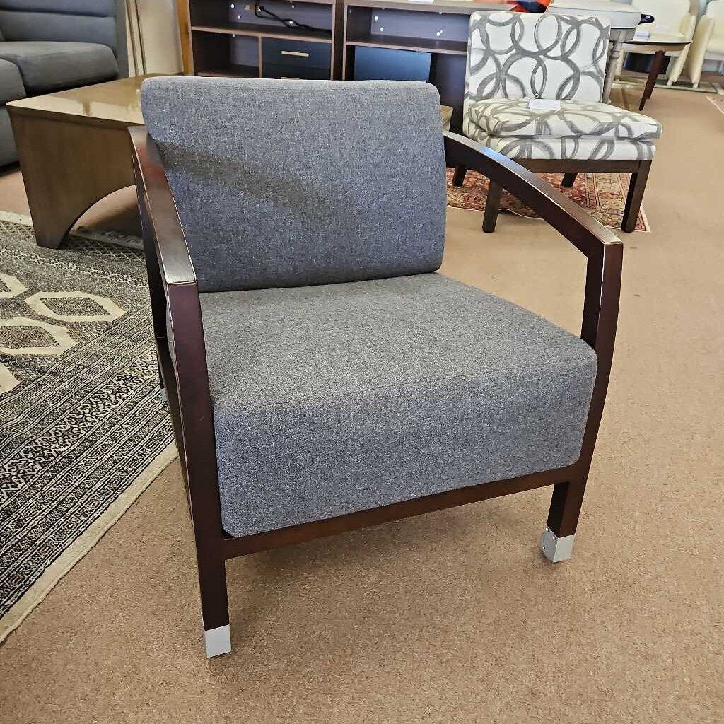 STUA Malena Chair Designed by Jon Gasca, Solid Wood Carved Upper Armrest, Slatted Back, End-Caps Front Legs, Wheels Back Legs 25 x 31.5 x 27.5