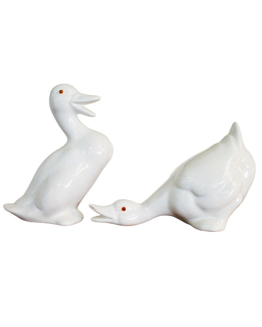 White Pottery Ducks, Head Down, Glass Eyes 4.25W 7D 9.5H; 17W 6.5D 6.75H - PAIR